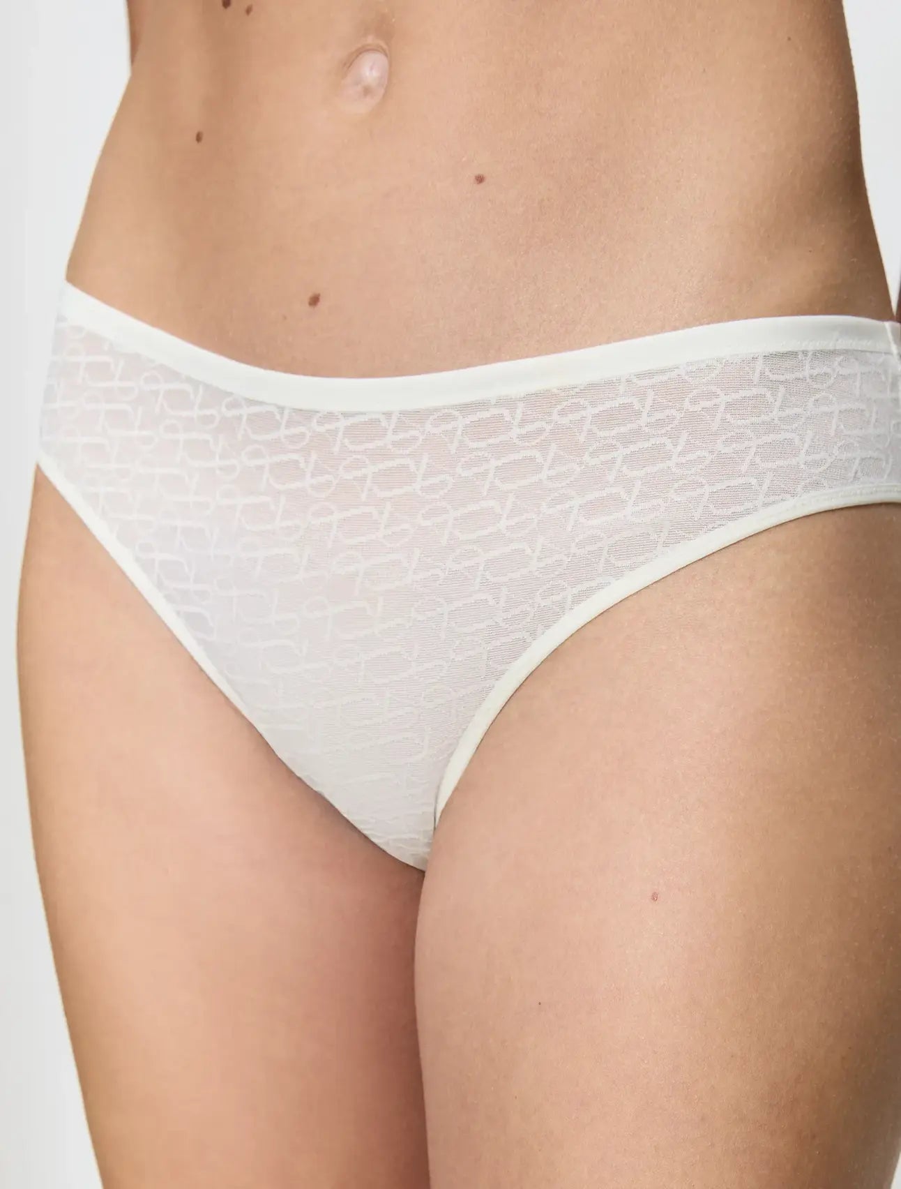 Triumph Signature Sheer Tai